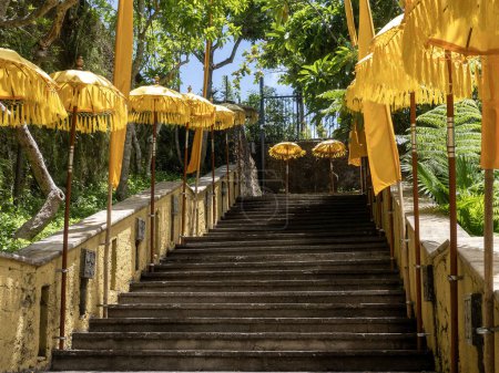 Photo for Staircase with umbrellas in Garuda Wisnu Kencana Cultural Park, Bali Indonesia - Royalty Free Image