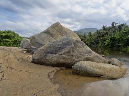 Graceful boulders on the coast in Tayrona National Park. Colombi