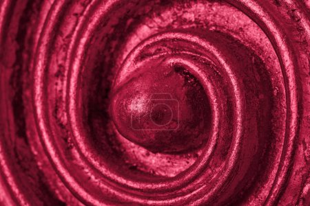 Photo for Relief spiral in metallic viva magenta color. Red abstract background for color of the year 2023 - Royalty Free Image