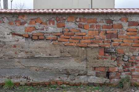 Photo for Unconventional masonry with different bricks - Royalty Free Image