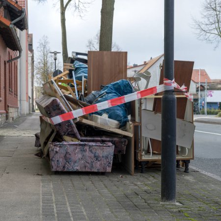 Photo for Pile of bulky waste with furniture and electrical appliances on the side of the road - Royalty Free Image