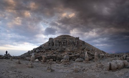 Photo for View of mount Nemrut and monumental sculptures of commagene kings and gods with colorful clouds and sky - Royalty Free Image