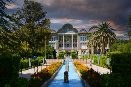 Photo for Persian garden of Eram with its beautiful pavilion, traditional Iranian fountain system and Palm trees in city of Shiraz, Iran. - Royalty Free Image