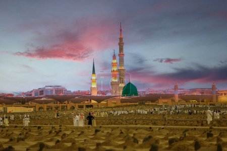 Photo for This Holy masjid located in the city of Madinah in Saudi Arabia. It is the one of the largest mosque in the world It is the second holiest site in Islam after Mak - Royalty Free Image