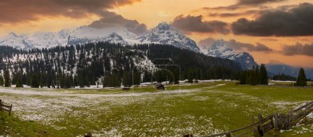 Photo for Hiker overlooking the Seebensee with Zugspitze and Sonnenspitze, Wetterstein Mountains, Alps, Tyrol, Austria, Europe - Royalty Free Image