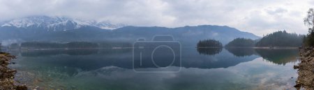 Eibsee lake with Zugspitze mountain range.