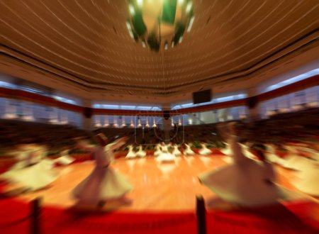 Photo for Dervishes perform on the stage for Mevlana - Royalty Free Image