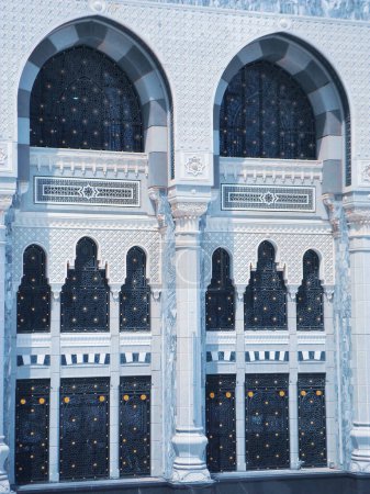 Holy Kaaba gate and walls, Muslims circumambulating