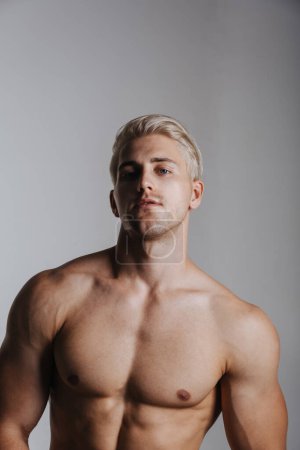 Photo for Blond male model portrait. Close up of handsome young man. Shirtless muscled guy in studio. - Royalty Free Image