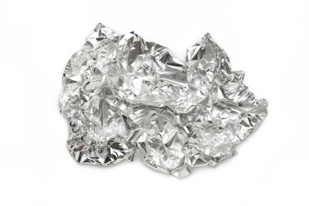 Photo for Crumpled aluminum foil isolated on white background. Top view - Royalty Free Image