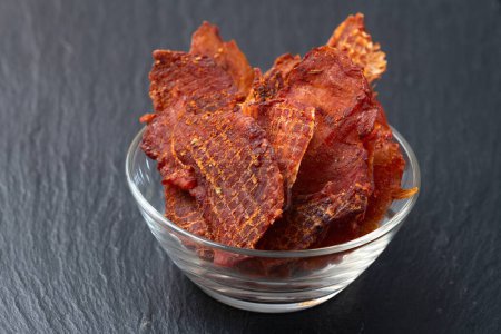 Mix of dried meat Jerky . From chicken , beef and pork. Beer snacks