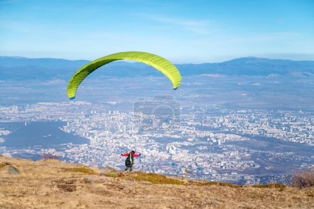 Paraglider at the start above the city of Sofia ,Bulgaria