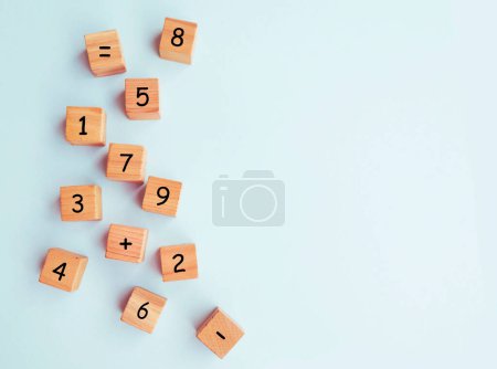 Photo for Wooden cubes with numbers on blue background - Royalty Free Image