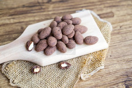 Almonds in chocolate .Healthy Chocolate covered almond