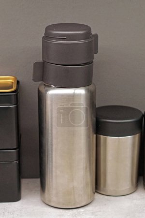 Photo for Insulated stainless steel vacuum bottle with cups reuse - Royalty Free Image