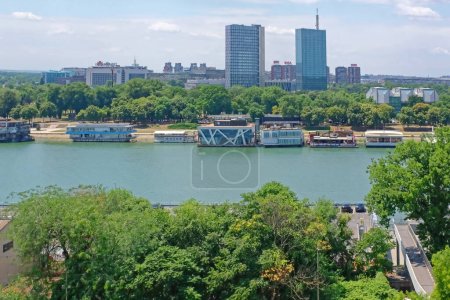 Photo for Belgrade, Serbia - July 5, 2021: Floating pontoon restaurants and clubs ar river Sava New Belgrade cityscape view from Kalemegdan park summer. - Royalty Free Image