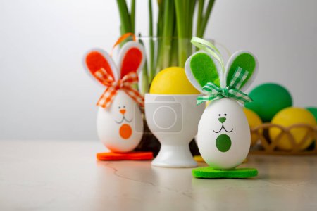 Foto de Easter bunny made of eggs holiday concept green and yellow - Imagen libre de derechos