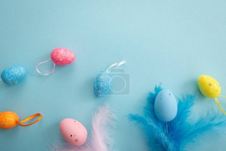 Photo for Blue Easter holiday background with egg decor feather copy space - Royalty Free Image