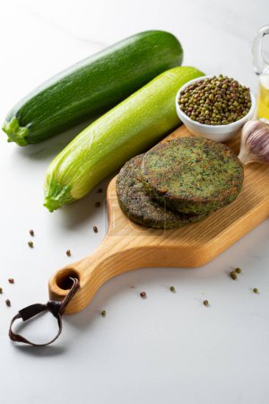 Photo for Vegan fritters zucchini mung pea beas - Royalty Free Image