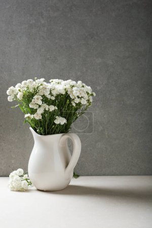 Photo for White small flowers in vase, gypsophila copy space - Royalty Free Image