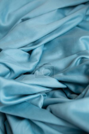 Téléchargez les photos : Texture de coton bleu satin linge de lit - en image libre de droit
