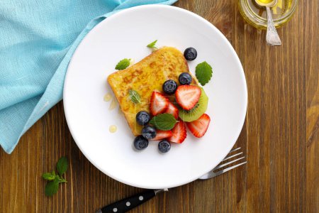 Photo for French toast with berry and fruits, food top view - Royalty Free Image