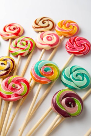Photo for Sweet lolli pop swirly candies confection  food background - Royalty Free Image