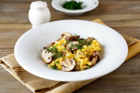 Photo for Tasty soft polenta with mushrooms, food - Royalty Free Image