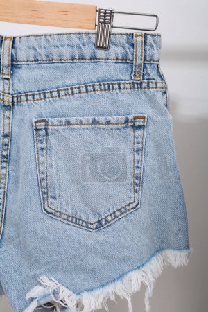Photo for Close up of back pocket of jeans shorts - Royalty Free Image