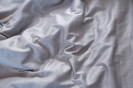 Téléchargez les photos : Gris Satin linge de lit coton textile matin salissant - en image libre de droit