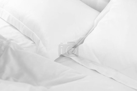 Photo for Whte cotton bed linen blanket and pillows - Royalty Free Image
