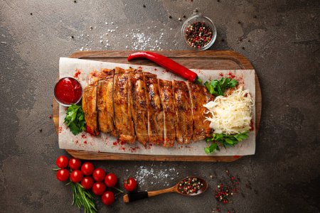 Photo for Close up of grilled ribs and vegetables on wooden platter food - Royalty Free Image