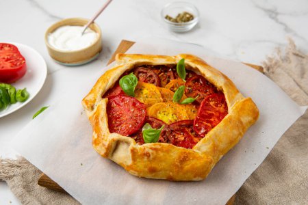 Photo for Close up of summer tomatoes tart rustic food - Royalty Free Image