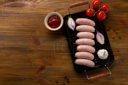 Photo for Top view of raw  sausages for grill bbq - Royalty Free Image
