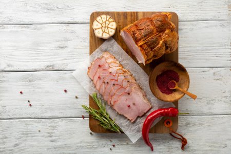 Photo for Piece of smoked ham meat and slices - Royalty Free Image