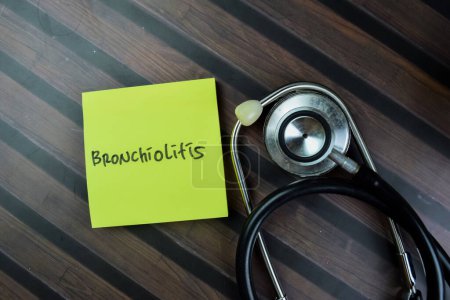 Photo for Concept of Bronchiolitis write on sticky notes isolated on Wooden Table. - Royalty Free Image