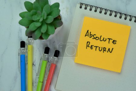 Photo for Concept of Absolute Return write on sticky notes isolated on Wooden Table. - Royalty Free Image