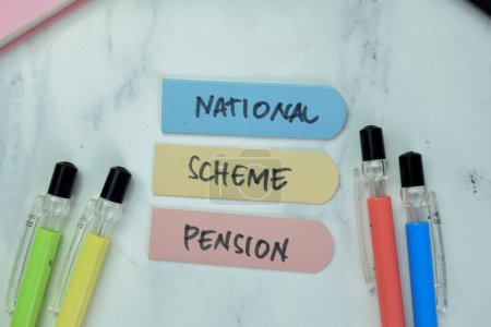 Concept of National Scheme Pension write on sticky notes isolated on Wooden Table.