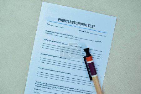Photo for Concept of Form Phenylketonuria Test write on paperwork isolated on Wooden Table. - Royalty Free Image