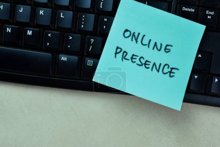 Concept of Online Presence write on sticky notes isolated on Wooden Table.