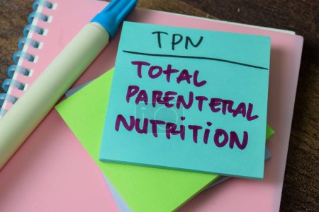 Photo for Concept of TPN - Total Parenteral Nutrition write on sticky notes isolated on white background. - Royalty Free Image