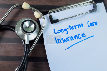 Photo for Concept of Long-term Care Insurance write on paperwork with stethoscope isolated on wooden background. - Royalty Free Image