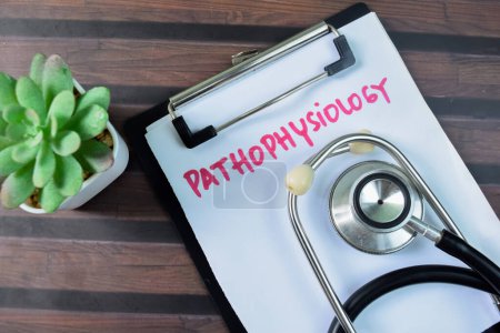 Concept of Pathophysiology write on paperwork isolated on wooden background.