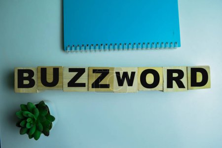 Photo for Concept of The wooden Cubes with the word Buzzword on wooden background. - Royalty Free Image
