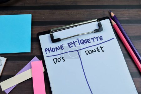 Concept of Phone Etiquette Do's and Don't's write on paperwork isolated on wooden background.