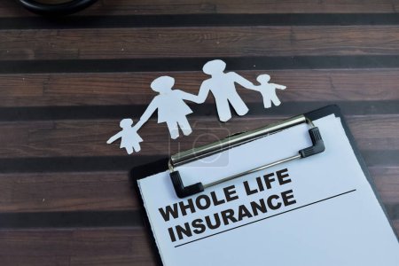Concept of Whole Life Insurance write on paperwork isolated on wooden background.