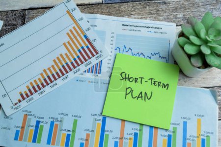 Photo for Concept of Short-Term Plan write on sticky notes isolated on Wooden Table. stock market concept - Royalty Free Image