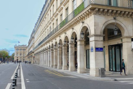 Photo for Paris, France. October 30. 2022. Haussmann style buildings perspective view in famous street Rue de Rivoli. - Royalty Free Image