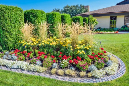 Beautiful delicately detailed flowerbed with blossoming flowers.