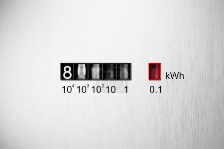 3D rendering of an electrometer measuring electricity consumption with a kWh counter. The electric meter display changes numbers, symbolizing the concept of rising costs of electric power.